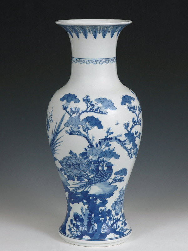 vase itwh flower ,bird and fish tail
